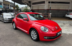 >Eggi Sudjana Nyetir Mobil Merah di Malaysia, Ternyata VW Beetle 2013 Segini Harganya